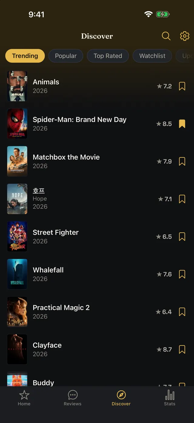 Discover tab with Trending, Popular, Top Rated, and Watchlist segments over a list of films with community ratings